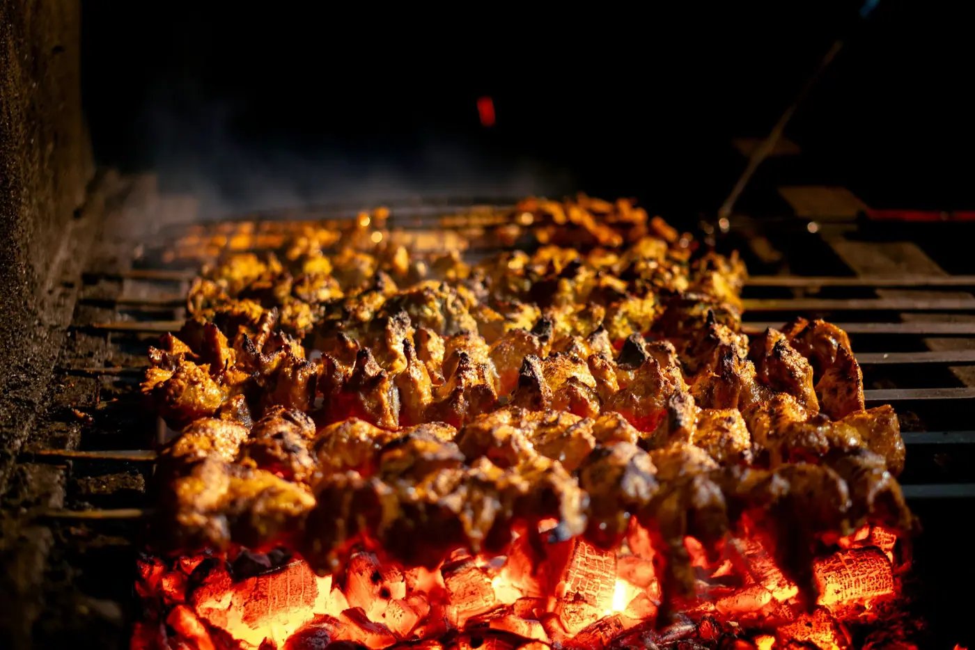 Juicy Chicken Skewers Grilling Over Flames